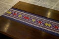 Close-up of a bench decorated with Zhuang brocade, a characteristic of the Zhuang nationality in Guangxi