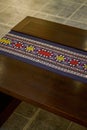 Close-up of a bench decorated with Zhuang brocade, a characteristic of the Zhuang nationality in Guangxi