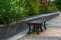 Close-up of benches on city sidewalk