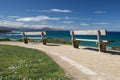 Close up on benches on coastal footpath cliff, relaxation concept, admiring scenic aerial view on atlantic coastline, bidart, fran