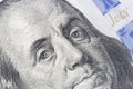 Benjamin Franklin`s stare on one hundred dollars banknote Royalty Free Stock Photo