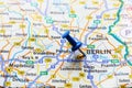 Close-up of Berlin marked on Germany map with blue pushpin - travel concept. Selective focus Royalty Free Stock Photo