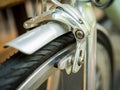 Close-up bicycle brakes and wheel on vintage bicycle Royalty Free Stock Photo