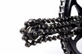 close-up of bicycle gears and chain on white background