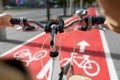 close up of bicycle's wheel on bike lane in city Royalty Free Stock Photo