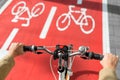 close up of bicycle's wheel on bike lane in city