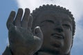 Close-up of Big Buddha hand and face Royalty Free Stock Photo
