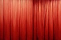 Close-up of a big red closed curtain, ai generated