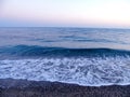 Close-up of big waves breaking on the coast in Liguria, Italy, Europe.