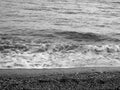 Close-up of big waves breaking on the coast in Liguria, Italy, Europe.