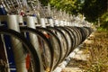 Close-up of bike wheels, public bike rental facilities on the street