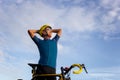 Close up of Biking cyclist man standing relax with bicycle in th