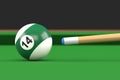 Close-up of billiard ball number fourteen in green and white color on billiard table