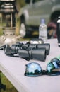 Close up of binoculars over camping table Royalty Free Stock Photo