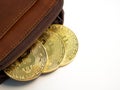 Close up bitcoin gold coins with wallet on the white background. Virtual cryptocurrency concept Royalty Free Stock Photo