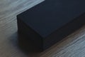 Close up of black blank business cards set isolated on wooden background, 3d rendering.