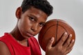 Close up of black boy basketball player hold ball Royalty Free Stock Photo