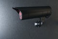 Close up of black CCTV camera on concrete wall background. 3D Rendering Royalty Free Stock Photo