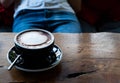 Close up black coffee cup with latte