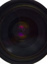 Close up of a black color camera lens of a digital camera placed over a black background Royalty Free Stock Photo