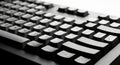 Close up of a black computer keyboard with white lettered keys showing technology and input device white background Royalty Free Stock Photo