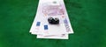 Close up of black dice and euro cash money Royalty Free Stock Photo