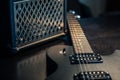 Close-up, black electric guitar on a dark background. Royalty Free Stock Photo