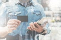 Close-up of black empty credit, business, calling, visiting card. On foreground virtual symbols.Man holds pasteboard. Royalty Free Stock Photo