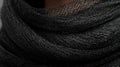 Close-up black fabric draped around neck, texture detail Royalty Free Stock Photo