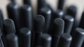 A close-up of black foam-tipped applicators on a light background Royalty Free Stock Photo