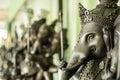 Close up black Ganesha statue and gray texture ganesh is hindu g