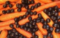 Close up Black Grapes and Carrots ready to be Juiced