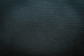 Close-up of black gray fabric texture. Surface detail of canvas textile rough abstract dark black clothes background. Design in yo Royalty Free Stock Photo