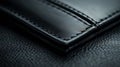 A close up of a black leather wallet with stitching, AI