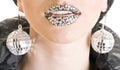 Close-up of black lips with strass Royalty Free Stock Photo