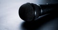 Black microphone on a black background Royalty Free Stock Photo
