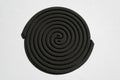 Close up of black mosquito coil isolated Royalty Free Stock Photo
