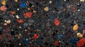 Close-up of a Black, Multi-Colored, Speckled Surface Royalty Free Stock Photo