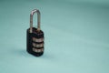 Close up, black padlock with password,pass code on blue background