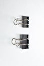 Close up of black paper clip, Bulldog clip for office stationery, Isolated on white background Royalty Free Stock Photo
