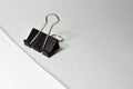 Close up of black paper clip, Bulldog clip for office stationery, Isolated on white background Royalty Free Stock Photo