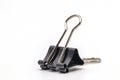 Close up black paper clip isolate on white background.Selective object on white. Royalty Free Stock Photo