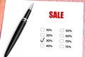 Close Up Black Pen And Checked 30% Discounted Rate At Sale Promotion