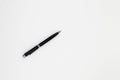 Close up of black pen on white background. Royalty Free Stock Photo
