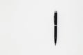 Close up of black pen on white background. Royalty Free Stock Photo