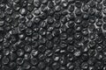 Close up of black plastic bubbles on a bubble wrap Royalty Free Stock Photo