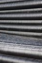 Close up of black plastic pipes with diminishing perspective Royalty Free Stock Photo