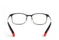 Close up Black and red glasses for view vision isolated on white Royalty Free Stock Photo