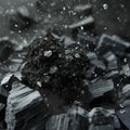 Close-up of black rock with splashing debris Royalty Free Stock Photo