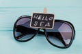 Close-up black sunglasses with chalkboard. Royalty Free Stock Photo